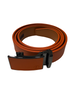 An orange textured leather belt with a ratchet automatic slide buckle, neatly coiled on a solid white background. Golf bag logo on buckle.